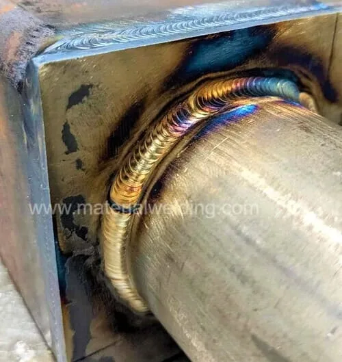 Image of a metal being welded onto a metal base