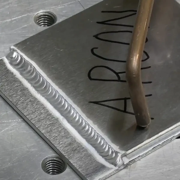 Image of a sheet of metal welded at the left-hand side with argon written on the sheet